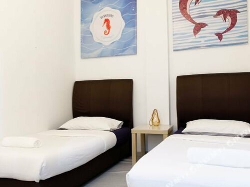 Гостиница Zen Rooms Island Backpackers в Семпорне