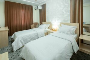 Orzu Tur Grand Hotel (Nodir Qoriyev ko'chasi, 1) ، فندق