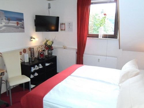 Фото Pension Oberkasseler Hof