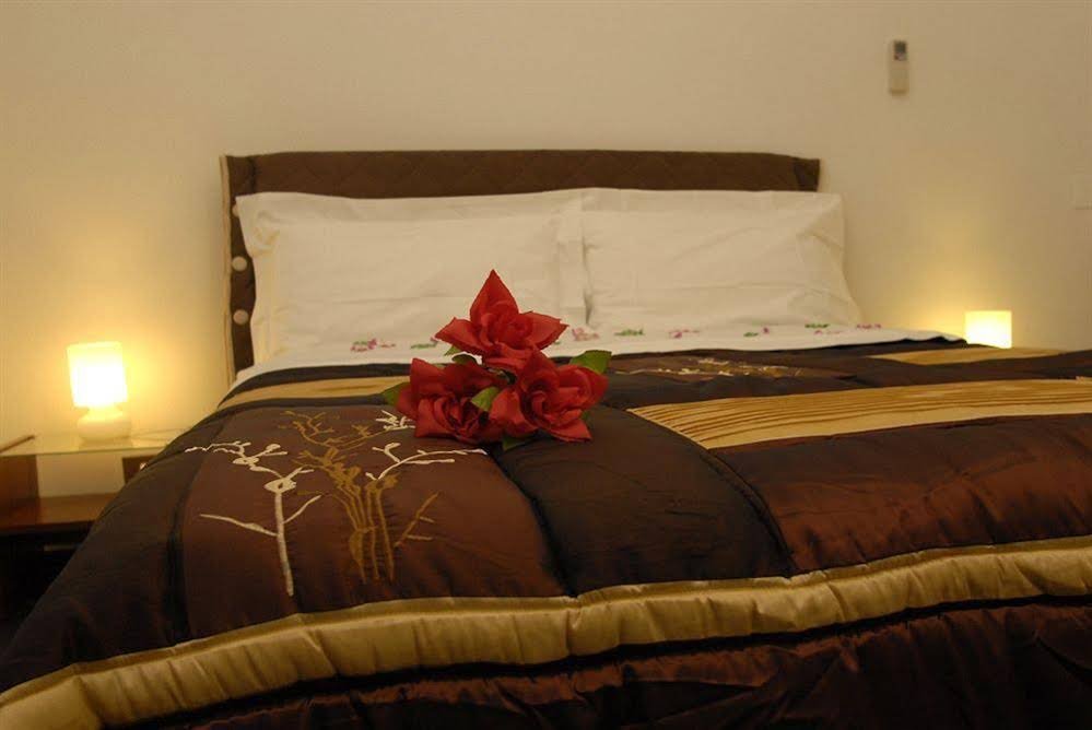 Фото B&t Rooms Trani