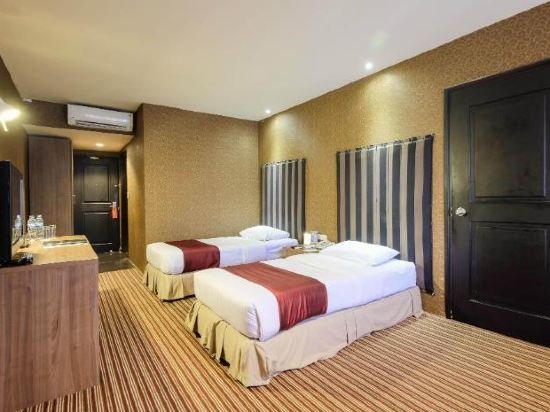 Фото Kenari Tower Hotel