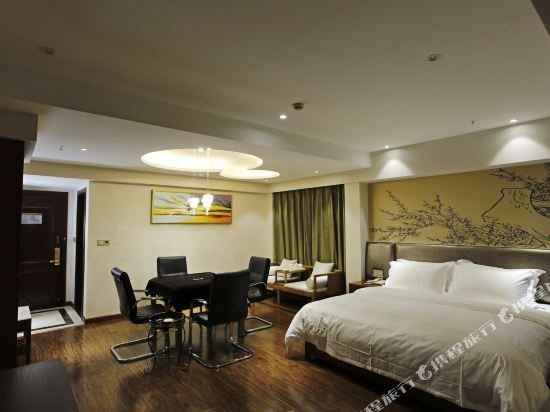 Фото Caifu Holiday Hotel