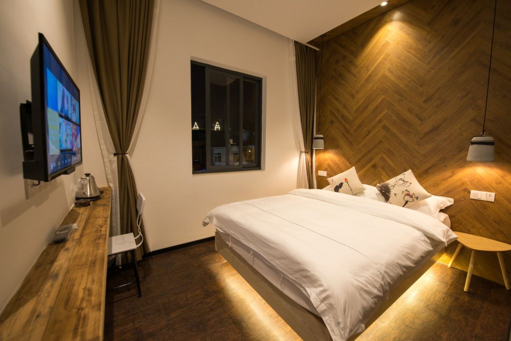 Фото Xiamen Feisu Tianchunshe Holiday Villa