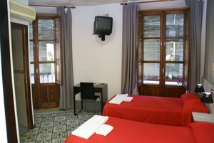 Гостиница La Perla Granada Suites