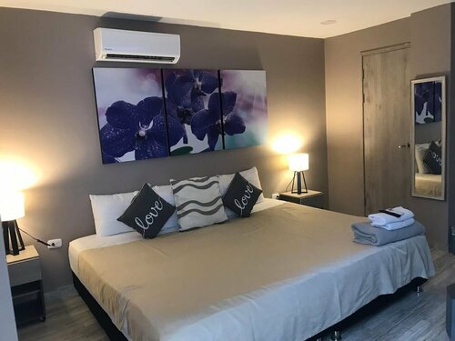 Гостиница Bahia 79 Apartasuites Cerca al Centro