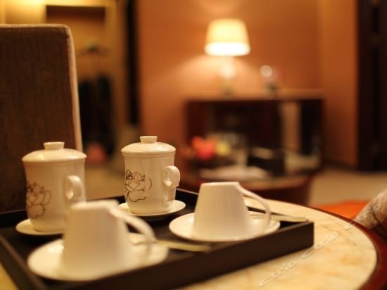 Фото Wuhan Tianchimel Hotel