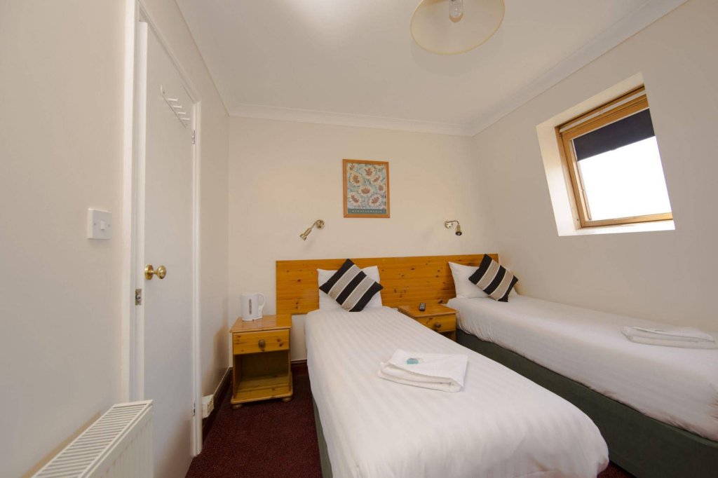 Фото Oyo Sino Hotel