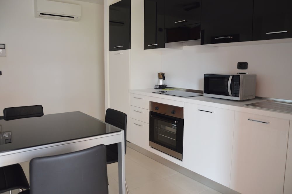 Фото Aparthotel Capitol