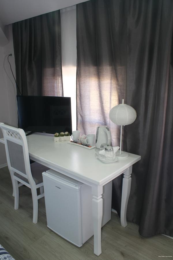 Фото Rose Garden Hotel