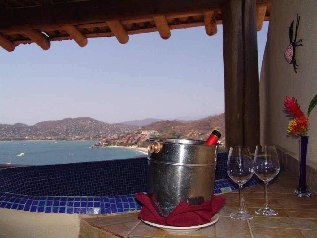 Фото La Escollera Suites Adults Only