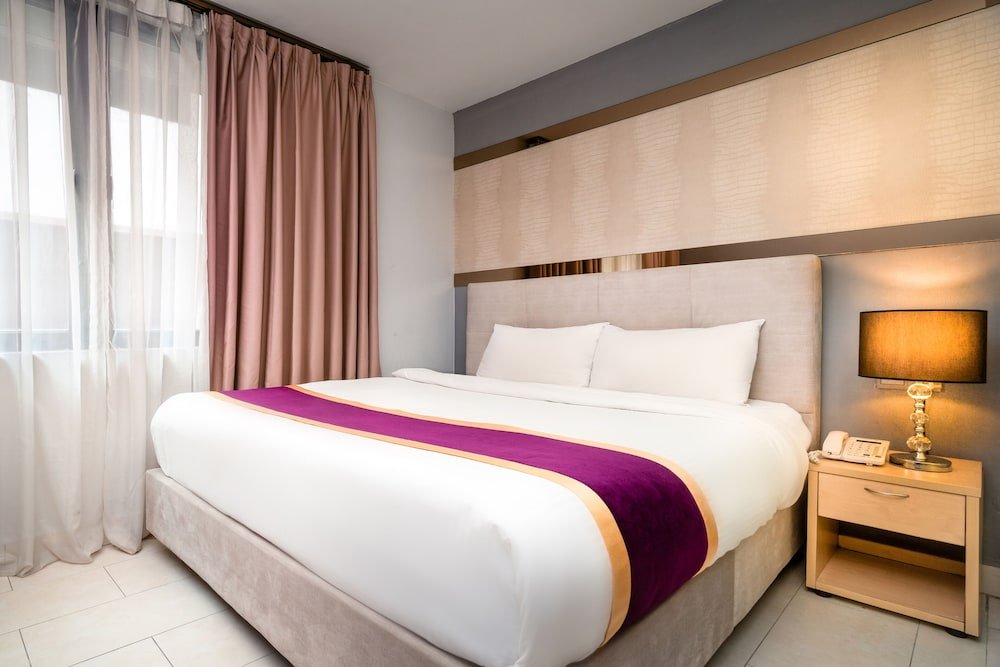 Фото Zen Rooms Royce Hotel