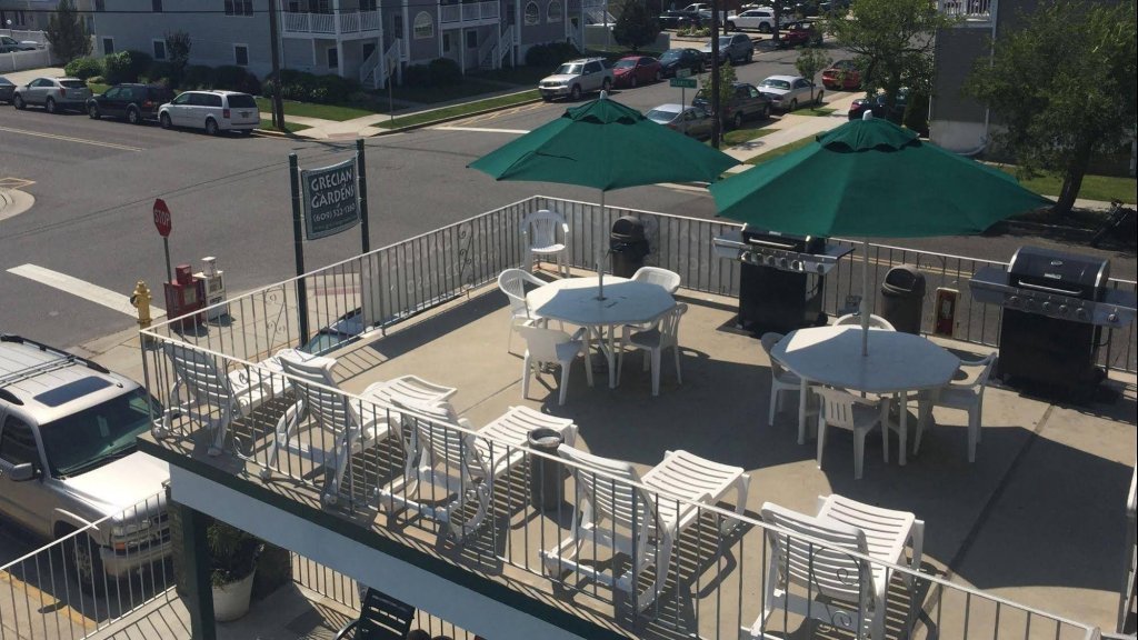 Фото Grecian Gardens Motel