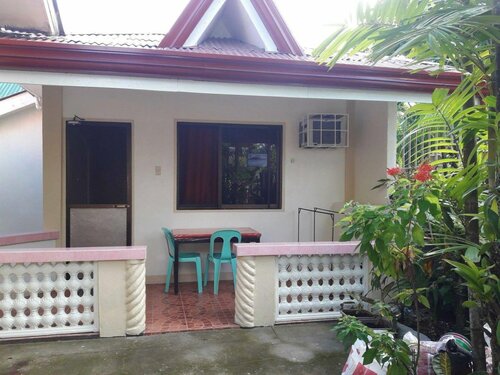 Гостиница Pabua's Cottages в Провинции Камигин