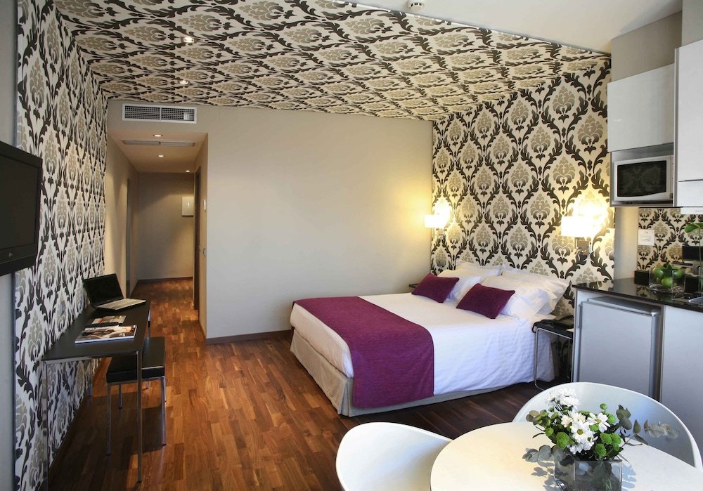 Фото Apartosuites Jardines de Sabatini