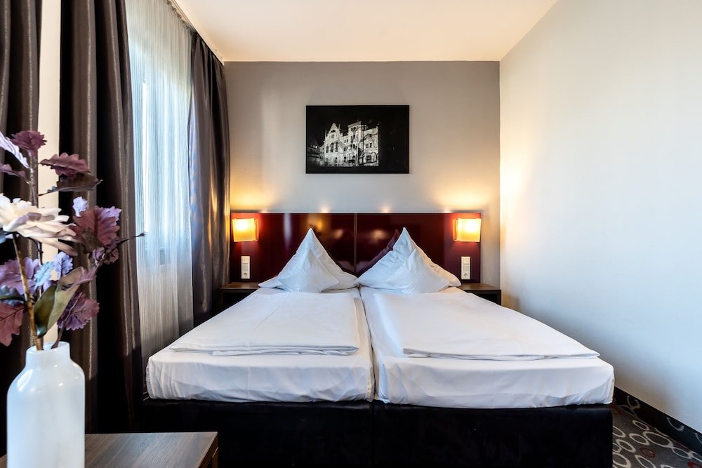 Фото Altstadthotel Guesthouse die Galerie