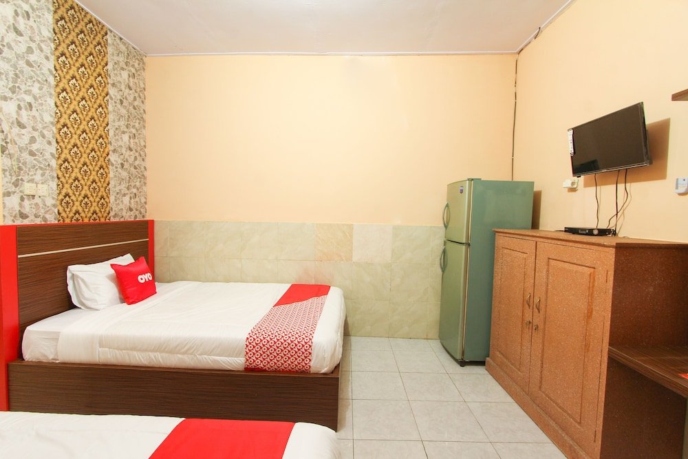 Фото Oyo 1594 Al Firdausi Residence