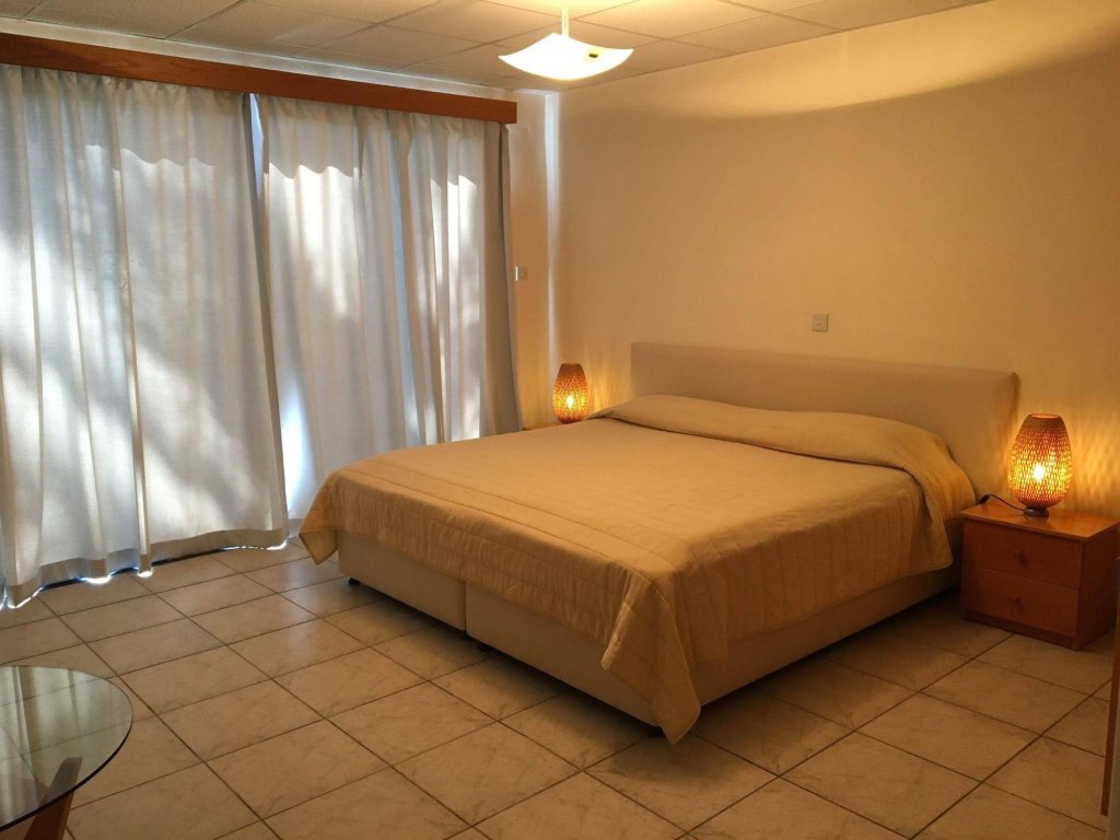 Фото Vrachia Beach Hotel & Suites - Adults only