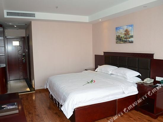 Фото GreenTree Inn Henan Xinyang Changan Road Business Hotel