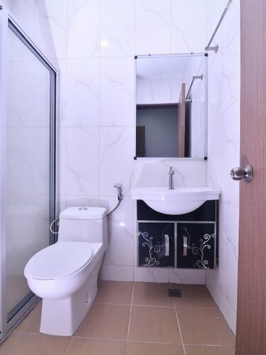 Гостиница Oyo 43960 Laksamana Executive & Boutique Hotel в Тавау