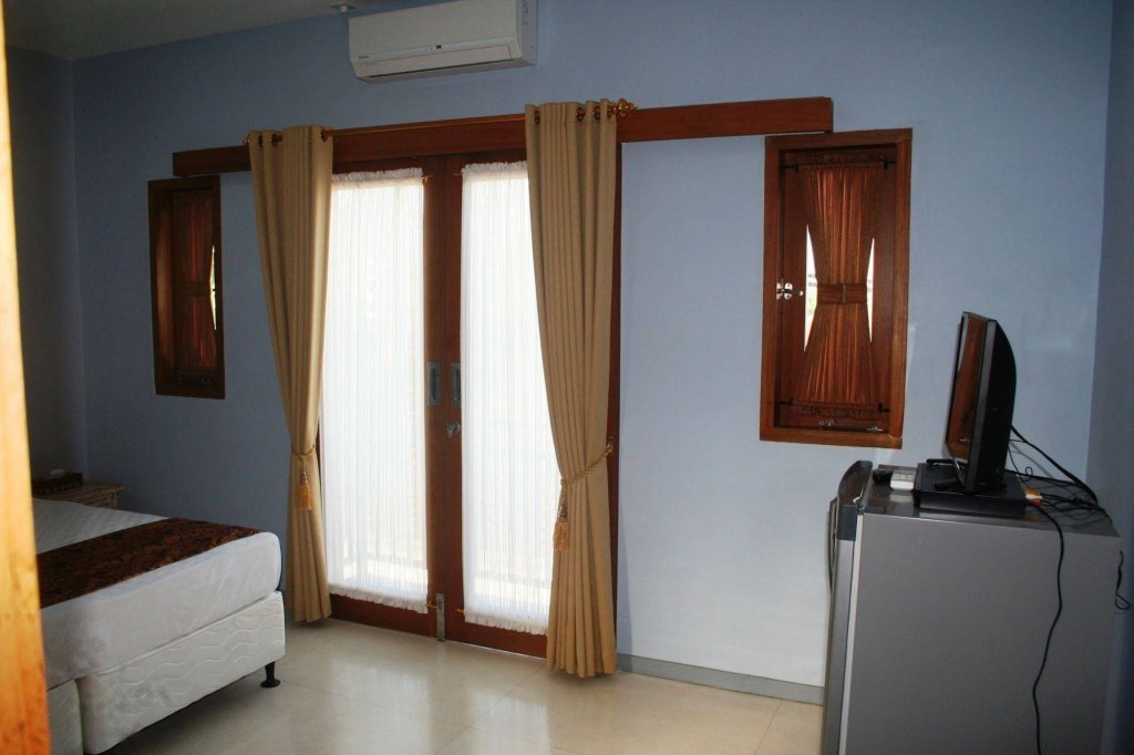 Фото Andy's Surf Villa & Bungalows