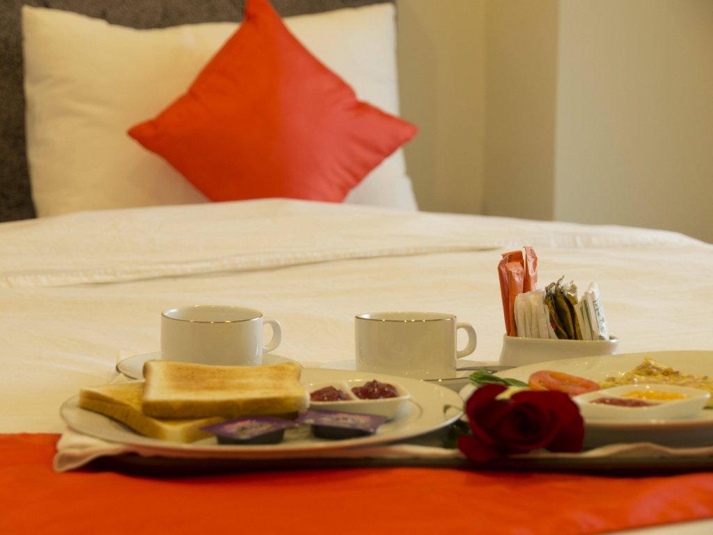 Фото The Gloria Suites Jakarta