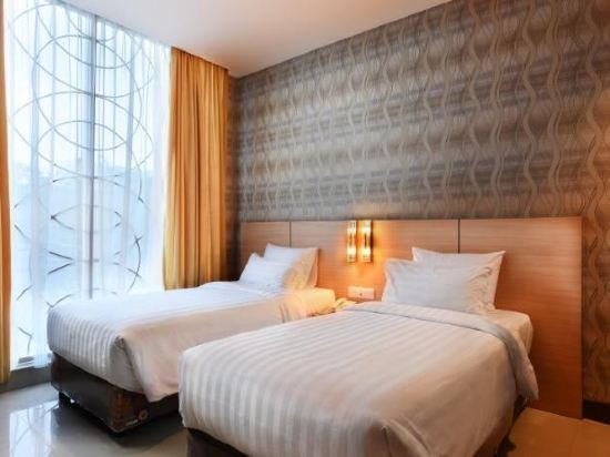 Фото Grand Impression Hotel Medan