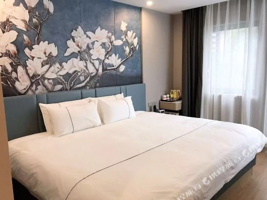 Фото Jinjiang Inn Shanghai Wanping Rd