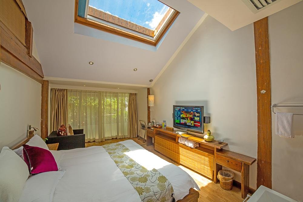 Фото Merry Inn Lijiang