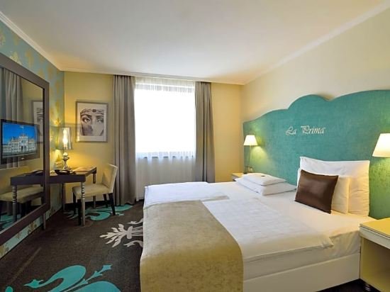 Фото La Prima Fashion Hotel