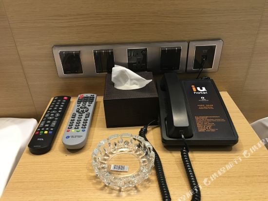 Фото Iu Hotels·Shangri-La Bus Terminal Songzanlin Temple