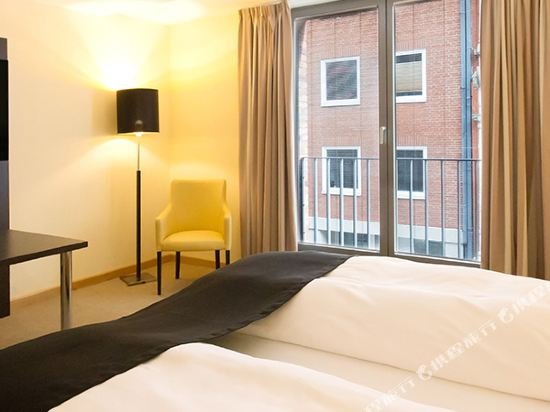 Фото Dormero Hotel Altes Kaufhaus Lüneburg