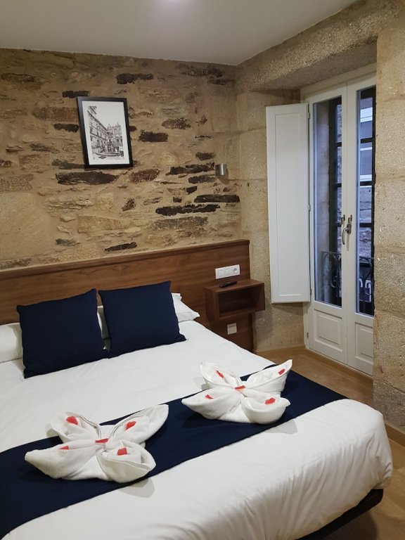 Фото Oxford Suites Santiago de Compostela