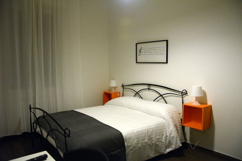 Фото Mambo Suites