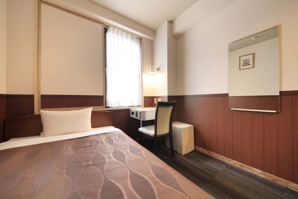 Фото Sendai Business Hotel