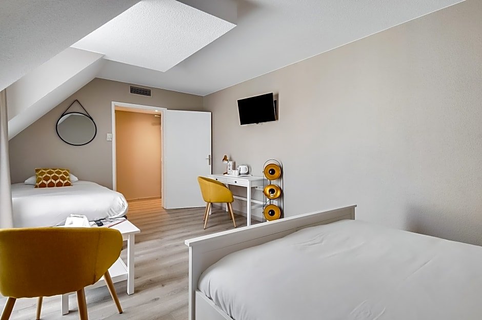 Фото La Maison Hotel Mulhouse