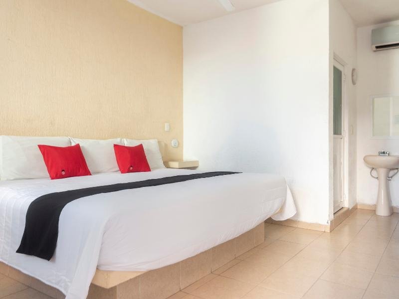 Фото Capital O Hotel El Mejicano