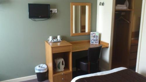 Фото Blue Bell Lodge Hotel