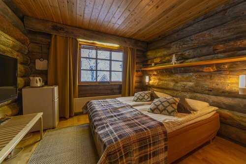 Гостиница Kuukkeli Log Houses Teerenpesä в Лапландии