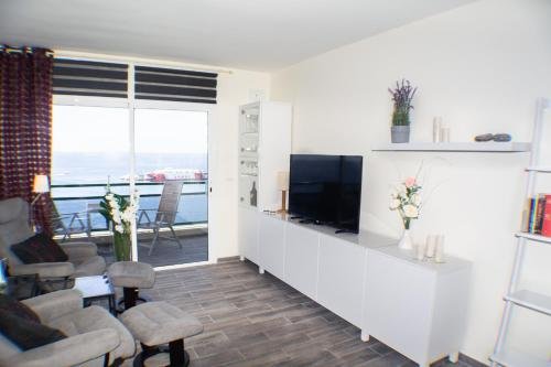 Фото Comodoro Apartments