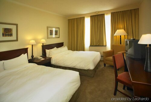 Внешний вид отеля Garden Court O. R. Tambo International Airport в Городе Метрополитенского Муниципалитете Экурхулени, фото 5