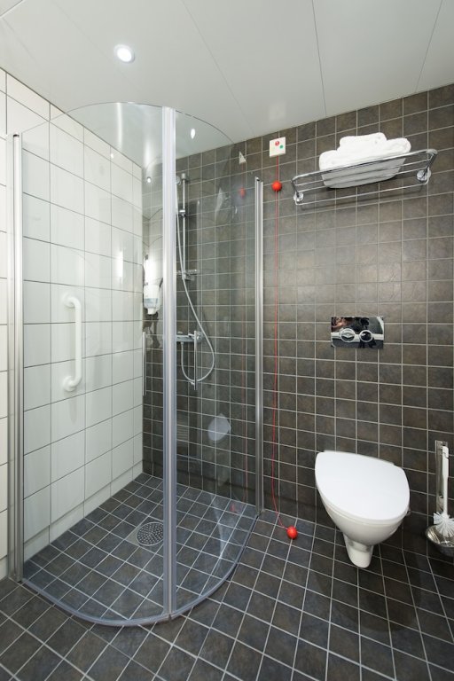 Фото Pingvinhotellet Unn Tromsø