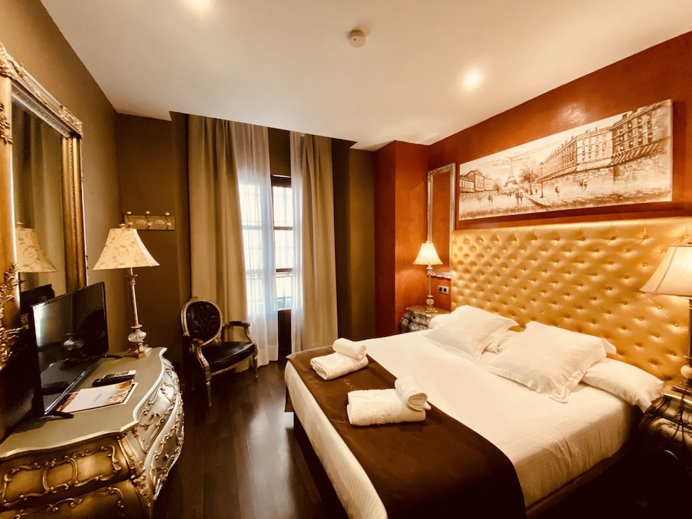 Фото Sweet Sevilla Suites