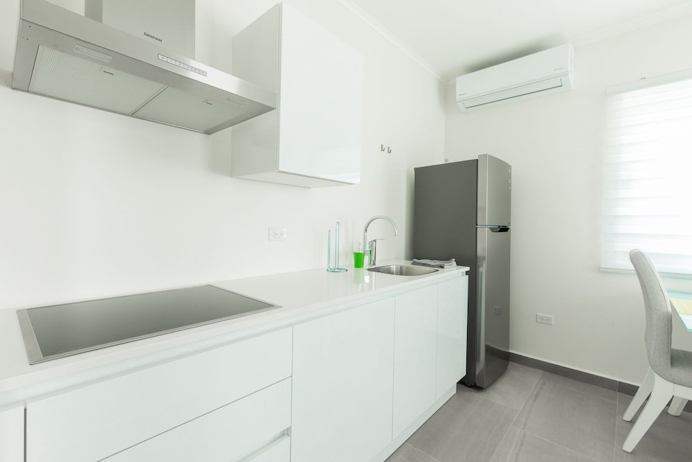 Фото The Palm Leaf Apartments