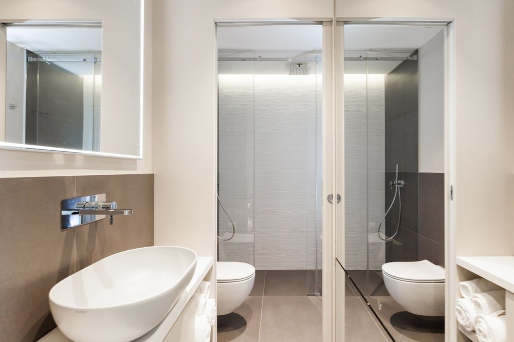 Фото Easyhomes - Duomo Suites & Apartments