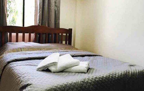 Апартаменты Honey Suites Dumaguete в Думагете