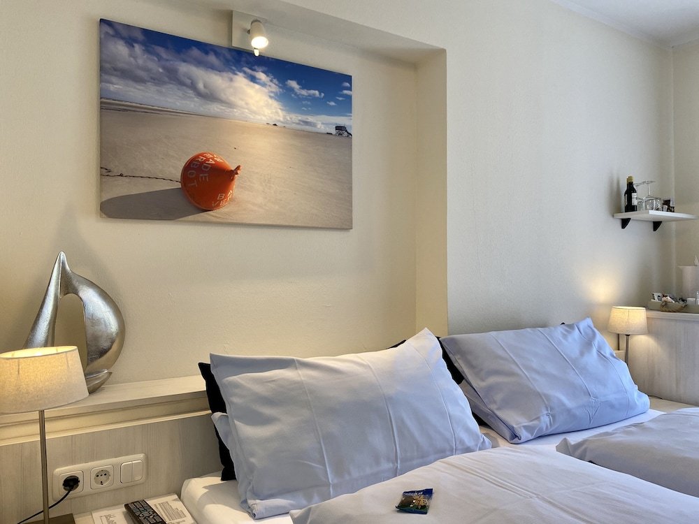 Фото Hotel garni DünenNest