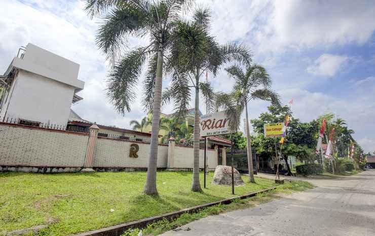 Фото Oyo 3180 Hotel Rian Cottage