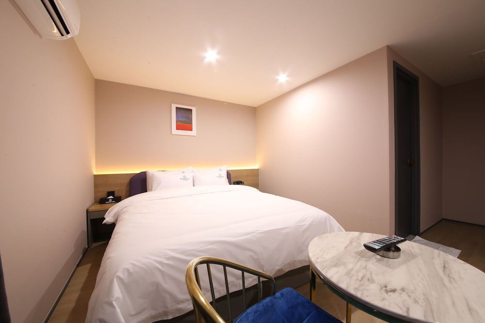 Фото Brown Dot Hotel Minam