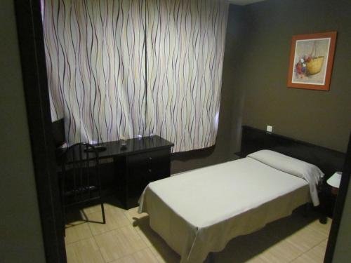 Фото Hostal Asador Julian Brunete