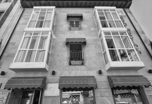 Фото Hostal Cuéntame Evolución Auto check in